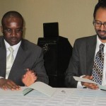 CEO of ECX & Chairman of AHCX sign information share agreements.