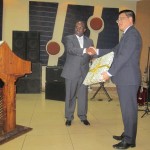 AHCX Chairman Presents a gift to Guest of Honour the Chinese Ambassador to Malawi